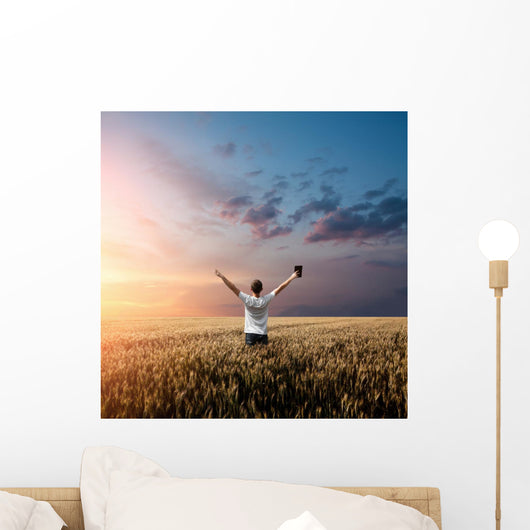 Man Holding up Bible Wall Decal
