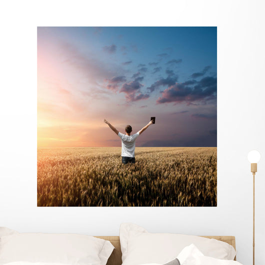 Man Holding up Bible Wall Decal