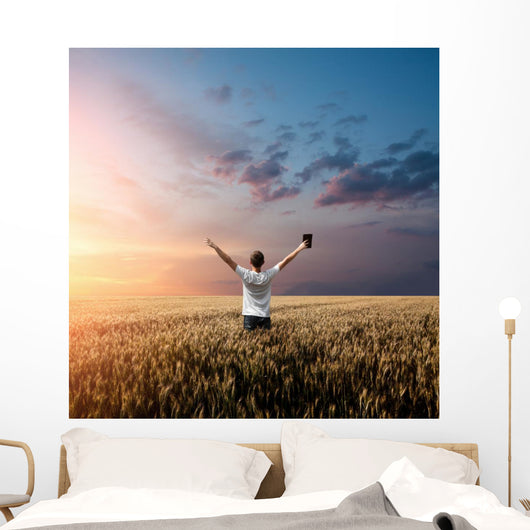 Man Holding up Bible Wall Decal