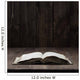 Image of an old  Holy Bible on wooden background on a wooden background in a dark space Wall Mural