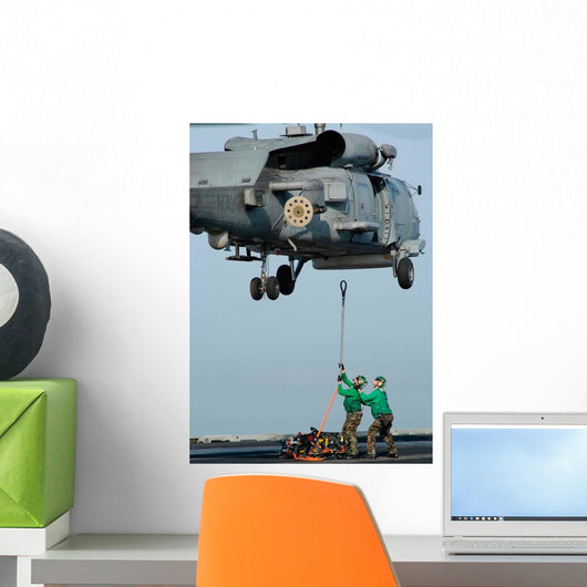 Airmen Assist Each Other Wall Decal
