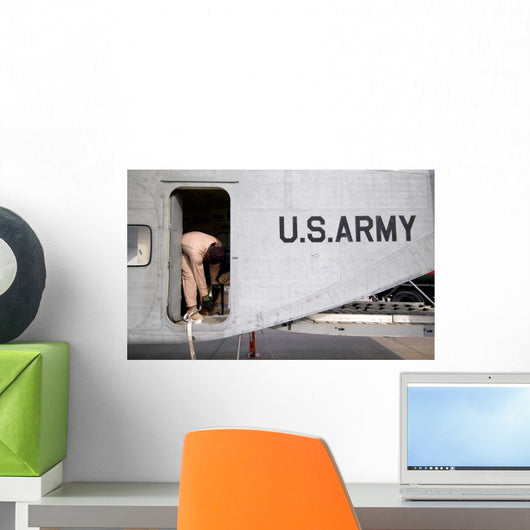 Flight Engineer Secures Equipment Wall Decal