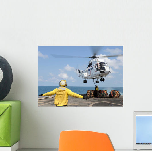 Sailors Attempt to Attach Wall Decal