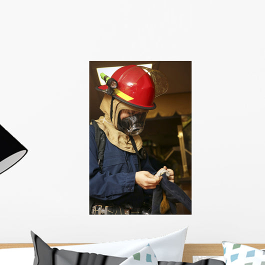 Machinery Repairman Puts Fire Wall Decal