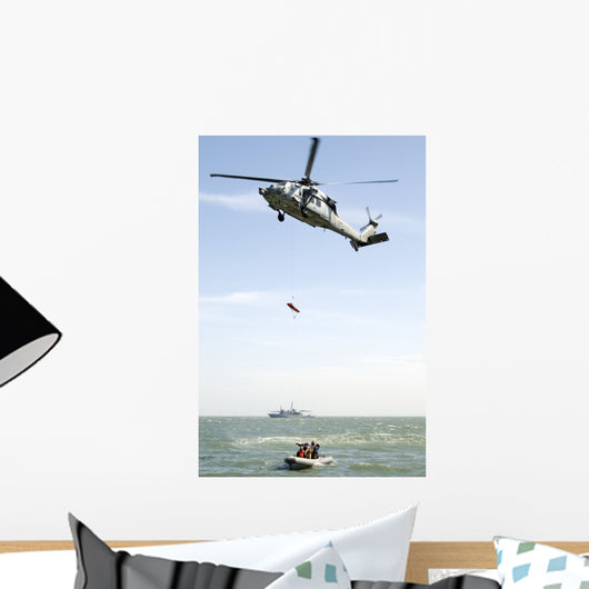 Litter Is Lowered from Wall Decal
