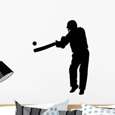 Hitting Cricket Player Wall Decal shown on a wall