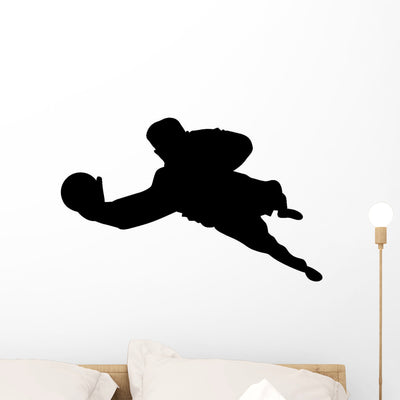 Defensive Dive Soccer Wall Decal shown on a wall