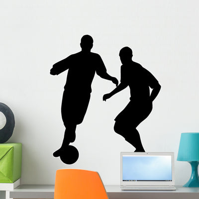 Playing Soccer Wall Decal shown on a wall