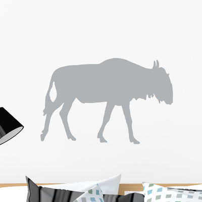 Animal Silhouette Wildebeest Grey Wall Decal shown on a wall
