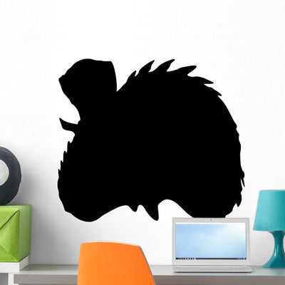 Black Oviraptor Head Silhouette Wall Decal shown on a wall