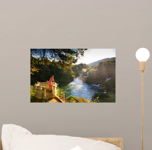 Young Woman Looks over Wall Decal