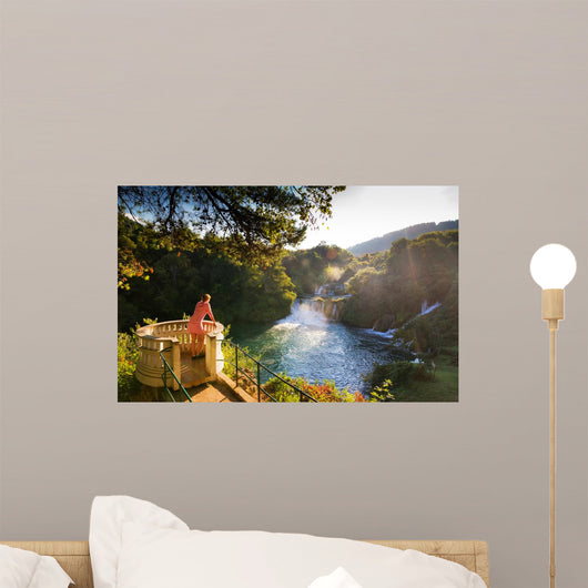 Young Woman Looks over Wall Decal