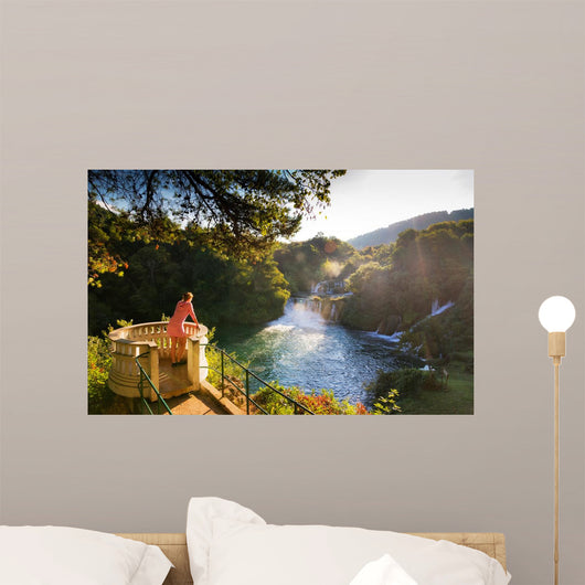 Young Woman Looks over Wall Decal