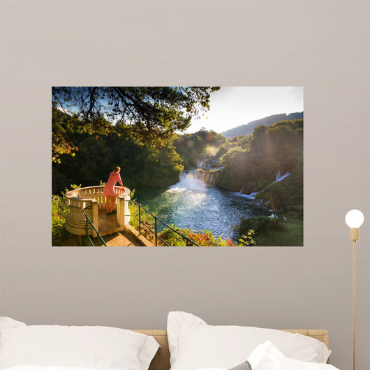 Young Woman Looks over Wall Decal