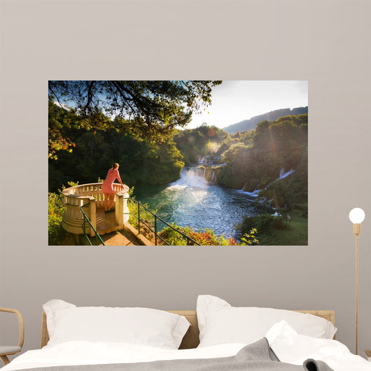 Young Woman Looks over Wall Decal