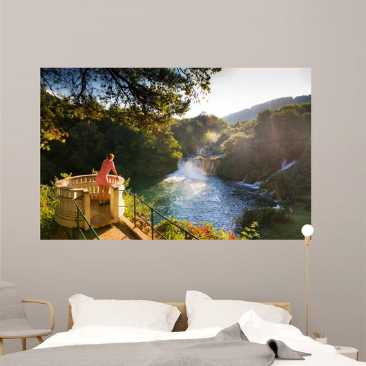 Young Woman Looks over Wall Decal