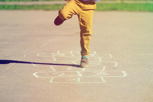 Little Boy Playing Hopscotch Wall Decal