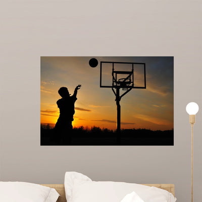 Teen Boy Shooting Basketball Wall Decal shown on a wall