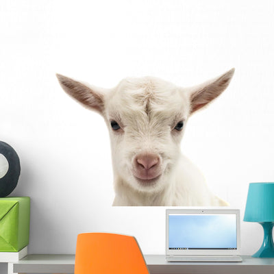 Small White Goat Wall Decal shown on a wall