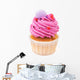 cupcake with pink buttercream isolated on white Wall Decal