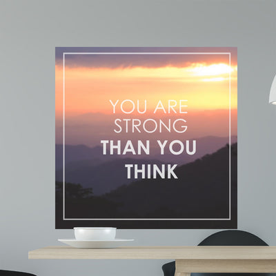Strength Inspirational Quote Wall Mural shown on a wall