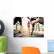 Joggers running outdoors Wall Mural