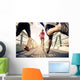 Joggers running outdoors Wall Mural