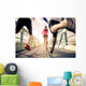 Joggers running outdoors Wall Mural