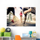 Joggers running outdoors Wall Mural