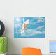Flying White Dove Isolated on Blue Sky Wall Mural