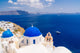 Wolrd famous blue dome churches in Oia, Santorini, Greece Wall Mural
