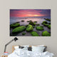 Green morning.
Rocky beach seascape at sunrise. Wall Mural