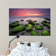 Green morning.
Rocky beach seascape at sunrise. Wall Mural