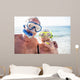Happy senior couple with their diving mask at beach  Wall Mural
