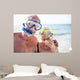 Happy senior couple with their diving mask at beach  Wall Mural