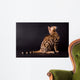 Bengal cat on a black background  Wall Mural