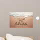 time to relax, concept written on sandy beach Wall Mural