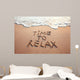 time to relax, concept written on sandy beach Wall Mural