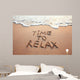 time to relax, concept written on sandy beach Wall Mural