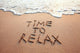 time to relax, concept written on sandy beach Wall Mural