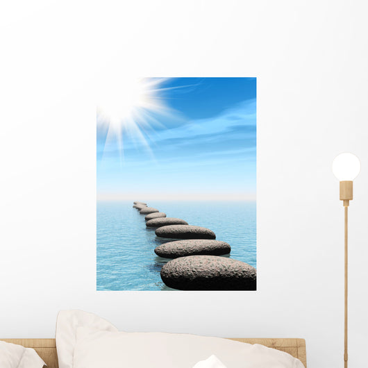 A row of stones in water with sun beam Wall Mural