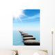 A row of stones in water with sun beam Wall Mural