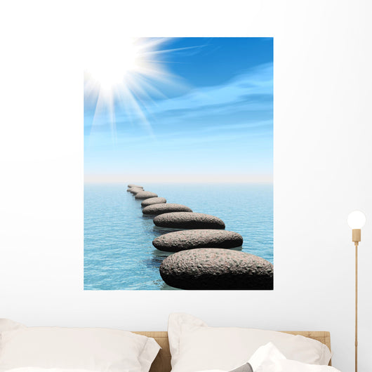 A row of stones in water with sun beam Wall Mural