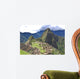 Machu Picchu is located in the Cusco Region of Peru, South America. It is situated on a mountain ridge above the Urubamba Valley in Peru, which is 80 kilometres (50 mi) northwest of Cusco  Wall Mural