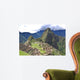 Machu Picchu is located in the Cusco Region of Peru, South America. It is situated on a mountain ridge above the Urubamba Valley in Peru, which is 80 kilometres (50 mi) northwest of Cusco  Wall Mural