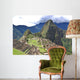 Machu Picchu is located in the Cusco Region of Peru, South America. It is situated on a mountain ridge above the Urubamba Valley in Peru, which is 80 kilometres (50 mi) northwest of Cusco  Wall Mural