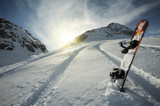 Snowboard in Mountains Wall Mural