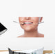 Smiling woman and dental tools Wall Decal