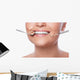 Smiling woman and dental tools Wall Decal