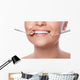 Smiling woman and dental tools Wall Decal